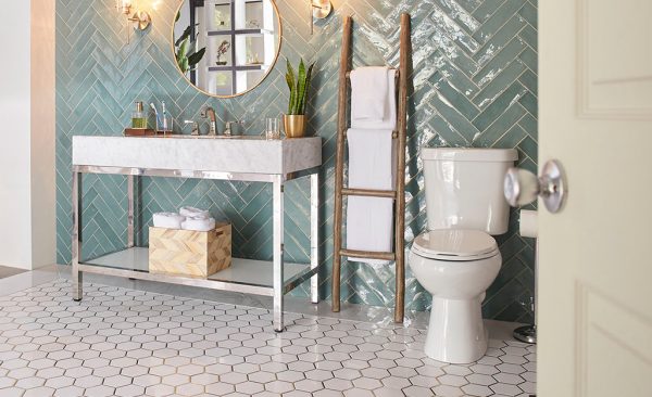 a well designed bathroom with unique tiles